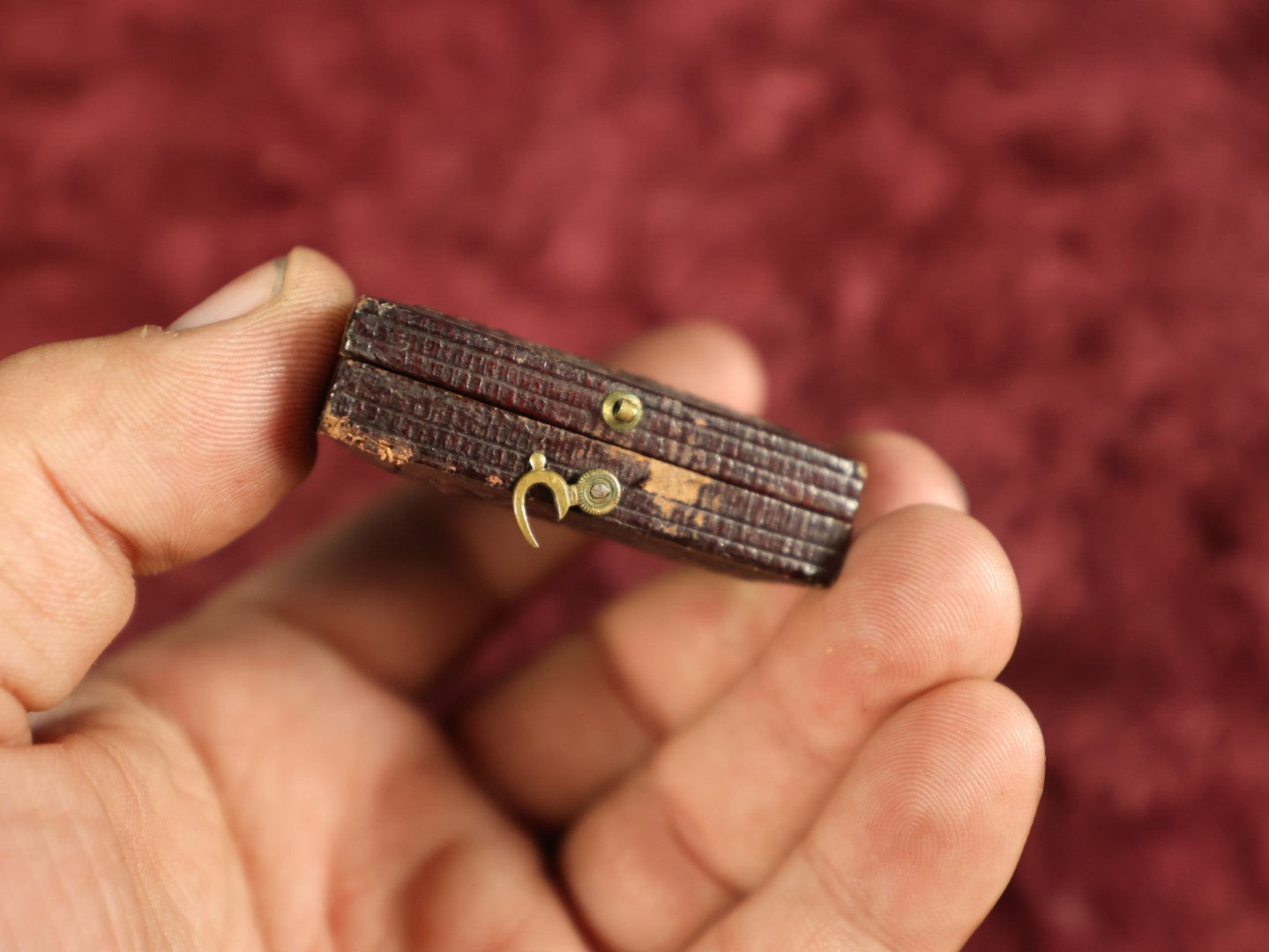 Lot 035 - Antique 1/16th Plate Daguerreotype Photograph In Intact Case Of Man With Beard, Flower On Red Pillow, Heavy Wear