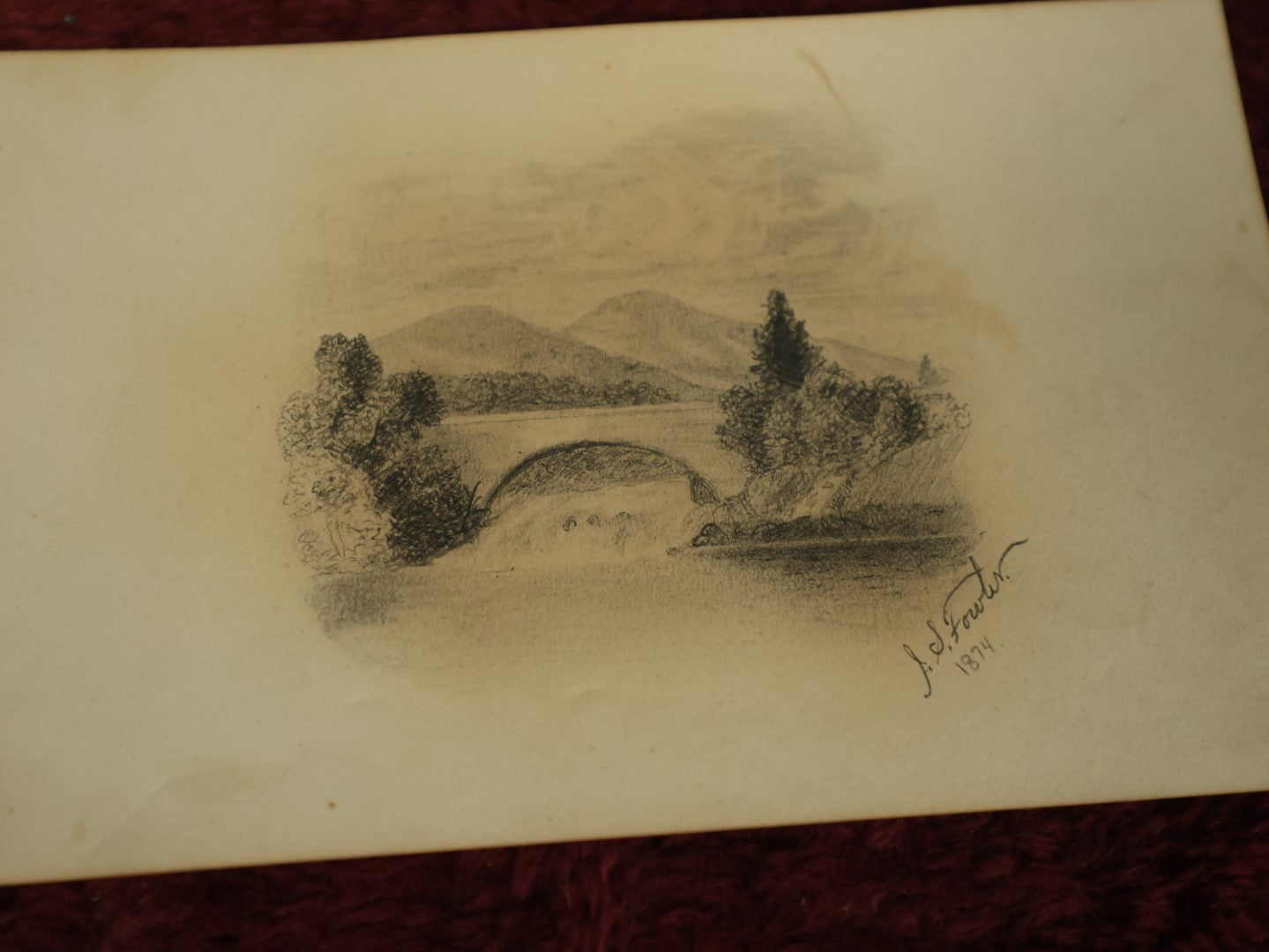 Lot 070 - Pair Of Original Landscape Pencil Sketches Depicting Waterfall, And Bridge With Mountains In The Background, Likely Out Of Autograph Album, One Dated 1885, Other Signed J.S. Fowler, 1874