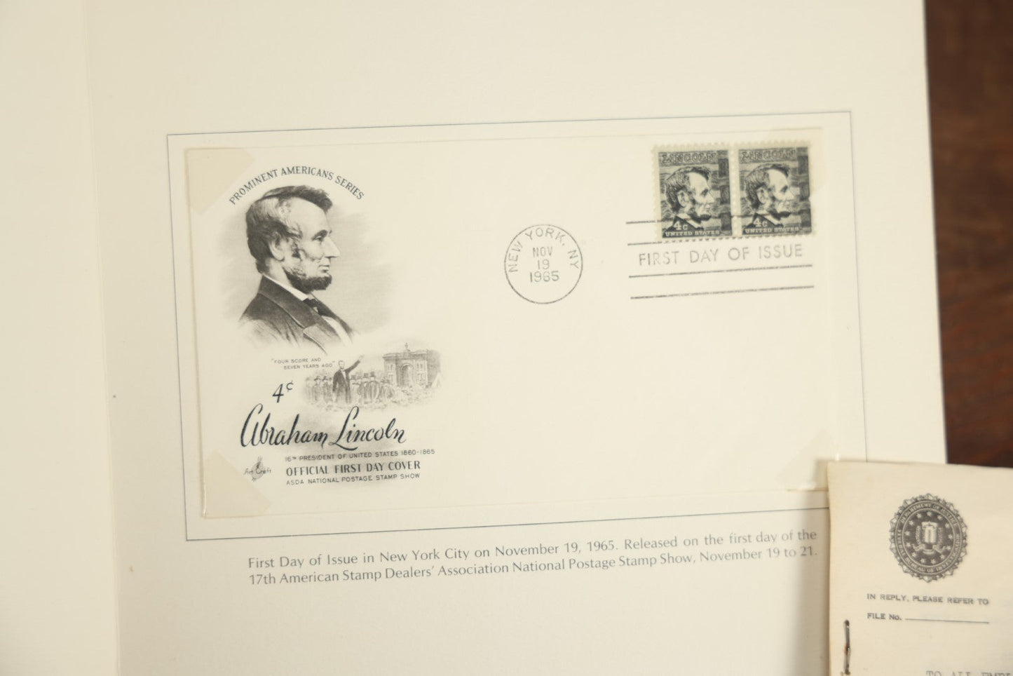 Lot 096 - Assorted Ephemera Grouping Including F.B.I, Memo With Facsimile J. Edgar Hoover Signature, Postcards, 4H Ribbons, Foreign Letter, Abraham Lincoln First Day Issue Stamp, And Apparel Credit Slip