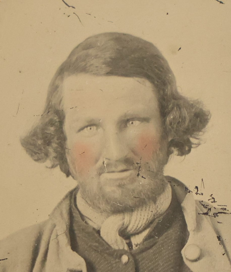 Lot 044 - Antique 1/9th Plate Tintype In Brass Mat Of A Middle Aged Bearded Man With Rosy Tinted Pink Cheeks, Slight Grin