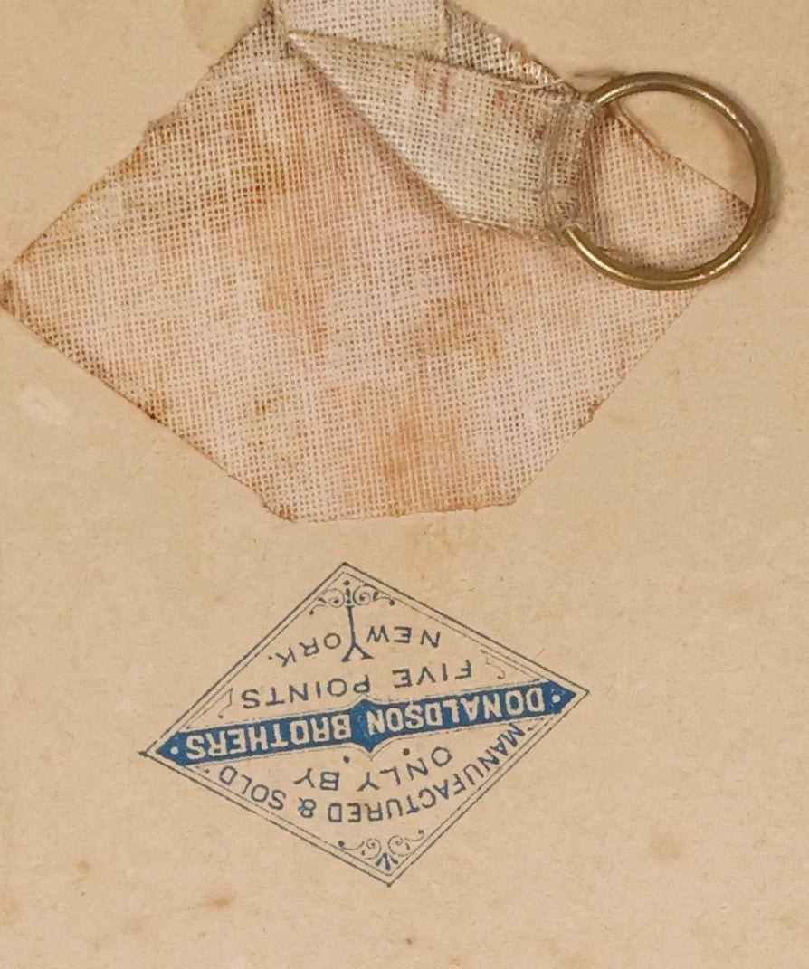 Lot 070 - Antique Wall Hanging Lithographed Decor, Little Girl On Beach In Seashell, Manufactured By Donaldson Brothers, Five Points, New York