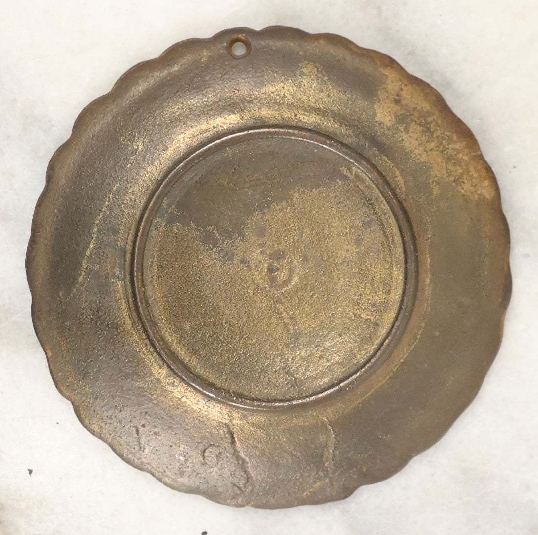 Lot 069 - Small Antique Cast Metal Cat Head Pendant Trinket Or Change Tray, Cat Has Flowers In Mouth, Hole At Top For Hanging Or Wearing