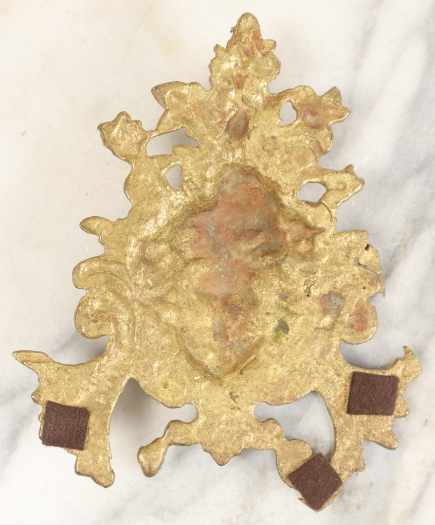 Lot 070 - Antique Cast Metal Gold Painted Fragment With Woman / Goddess' Head, With Ornate Design, Likely A Piece Of A Clock Or Other Decor Item