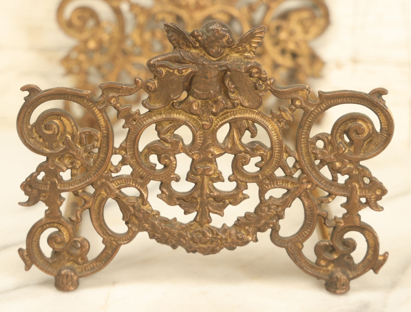 Lot 004 - Antique Brass Ormolu Extendable Book Stand With Cherub Motif