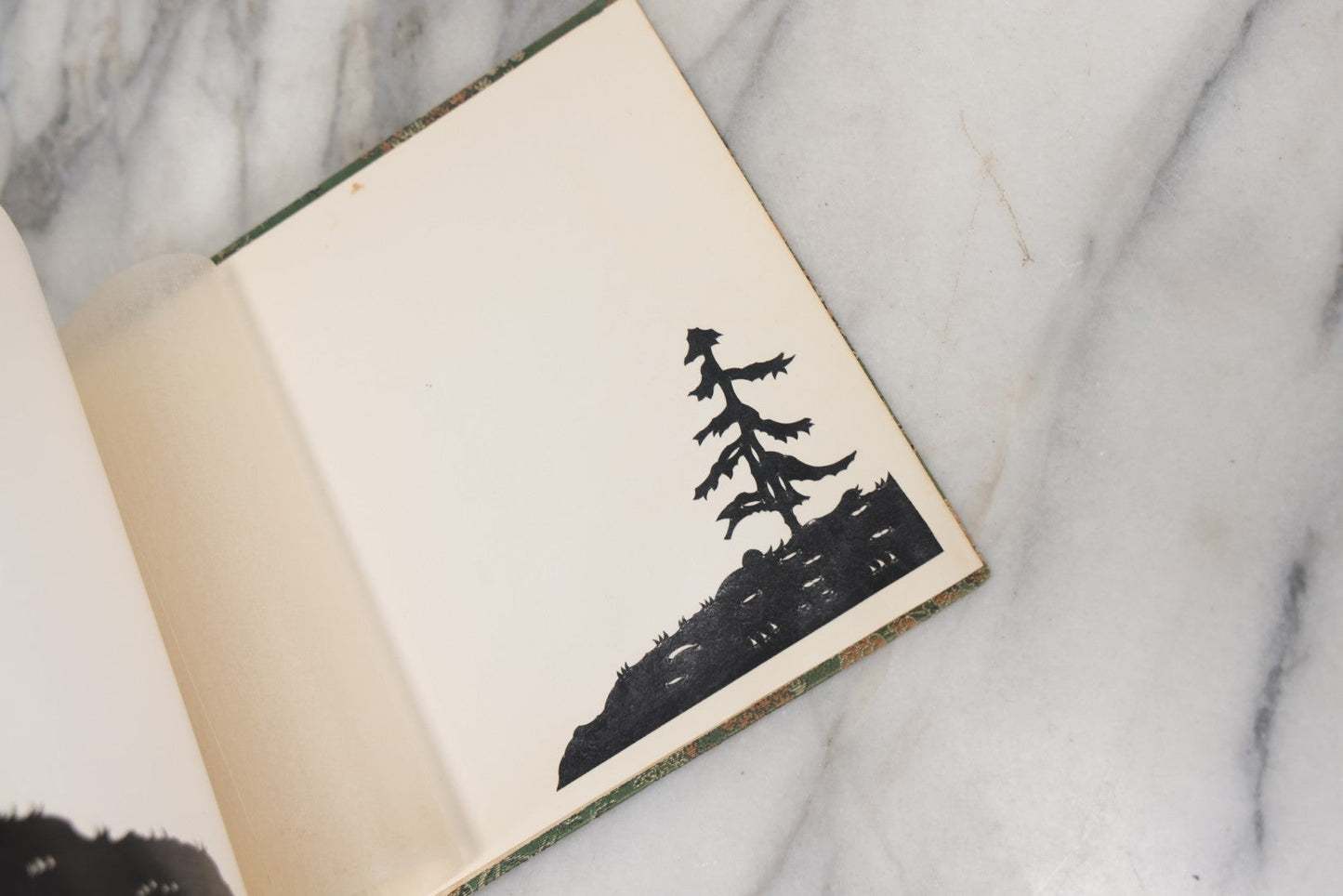 Lot 120 - Vintage East Asian Cloth Covered Art Book With Black Paper Cut Silhouettes