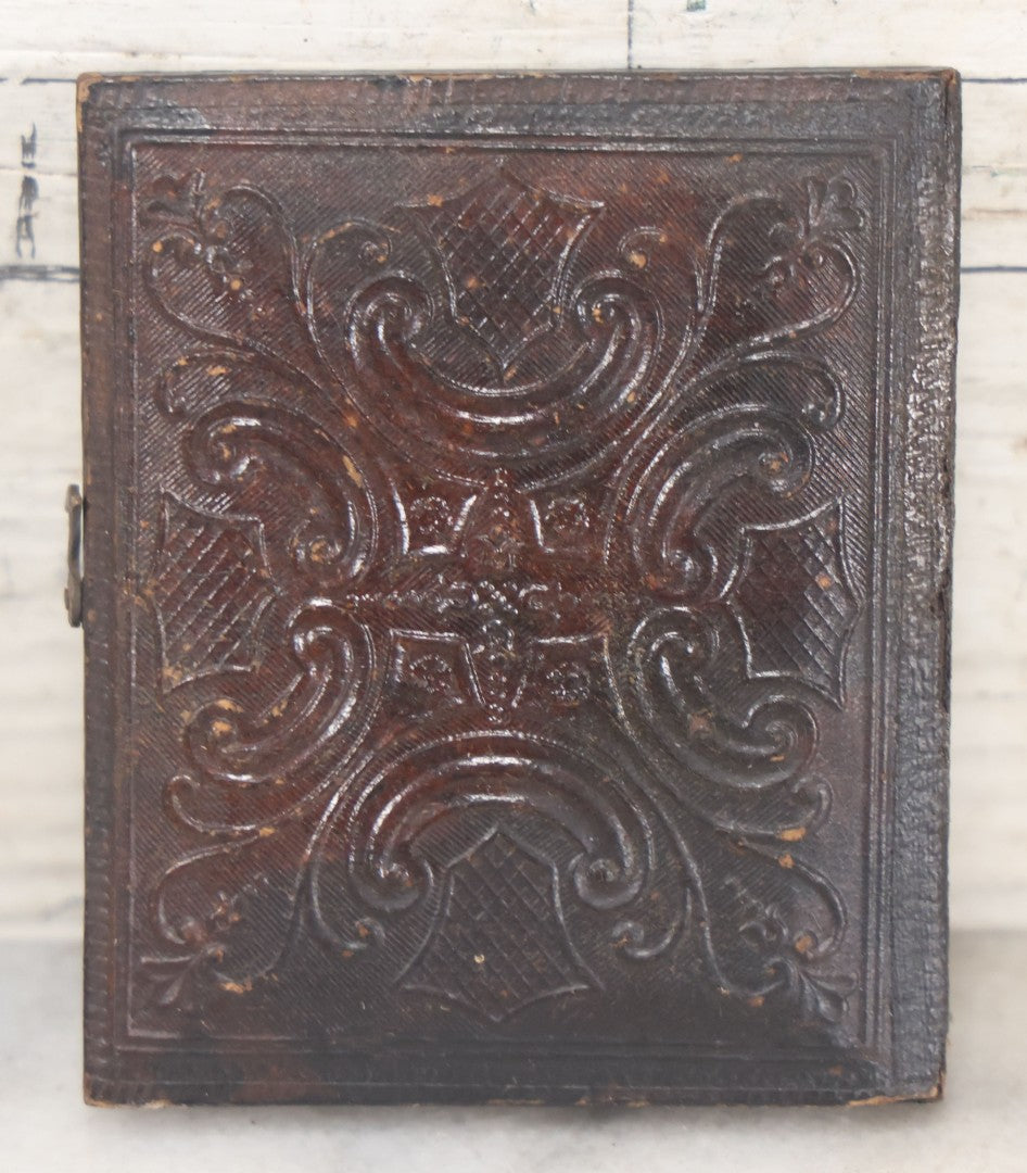 Lot 102 - Antique 1/6th Plate Cased Tintype Photograph Of A Little Girl Holding Her Doll, Half Leatherette Case