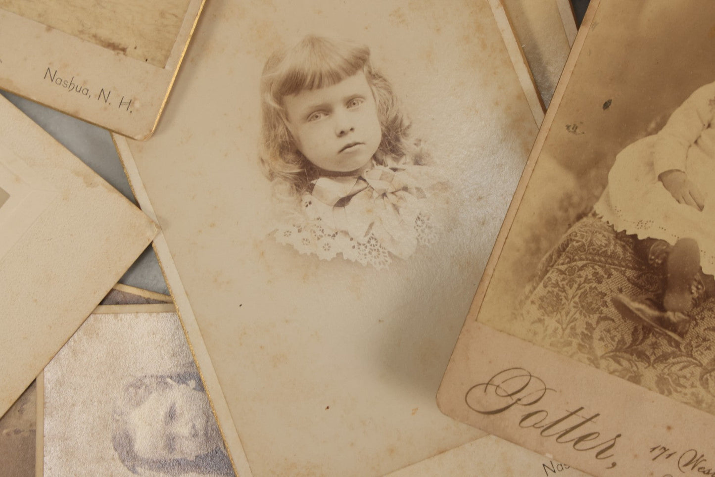 Lot 171 - Grouping Of 20+ Cabinet Card And Carte De Visite C.D.V. Photographs Of Men, Women, And Children, Including Little Girl With Hat, Smiling Toddler, And More
