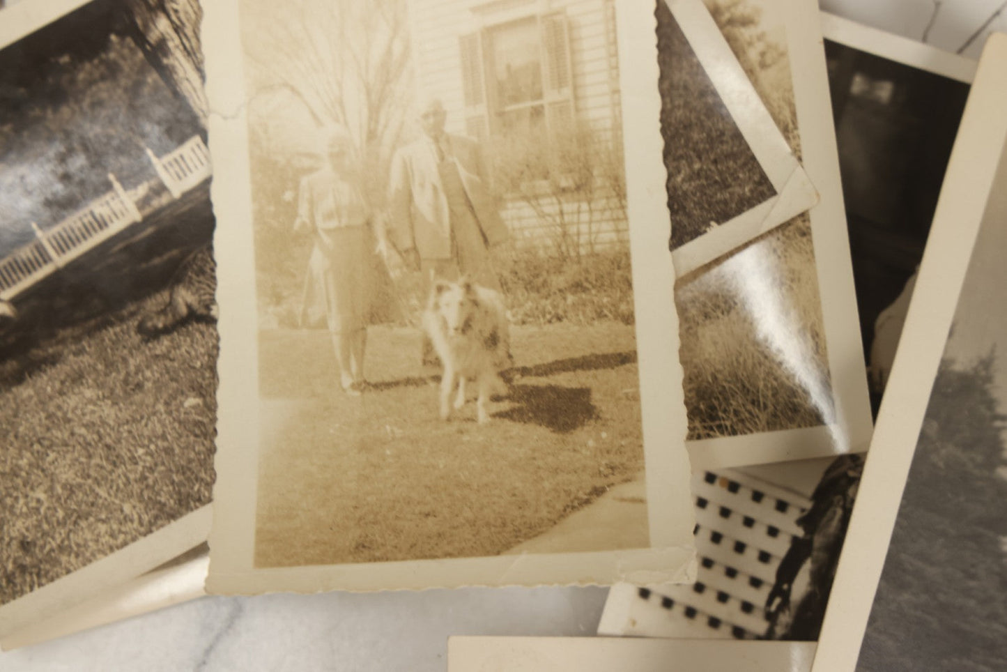 Lot 173 - Grouping Of 20+ Vintage And Antique Snapshot Photographs Including Boy With Baseball Bat, Boy With Bugle, Boy With Plane, Boy Riding Bike, Old Man In Stovepipe Hat, Etc.