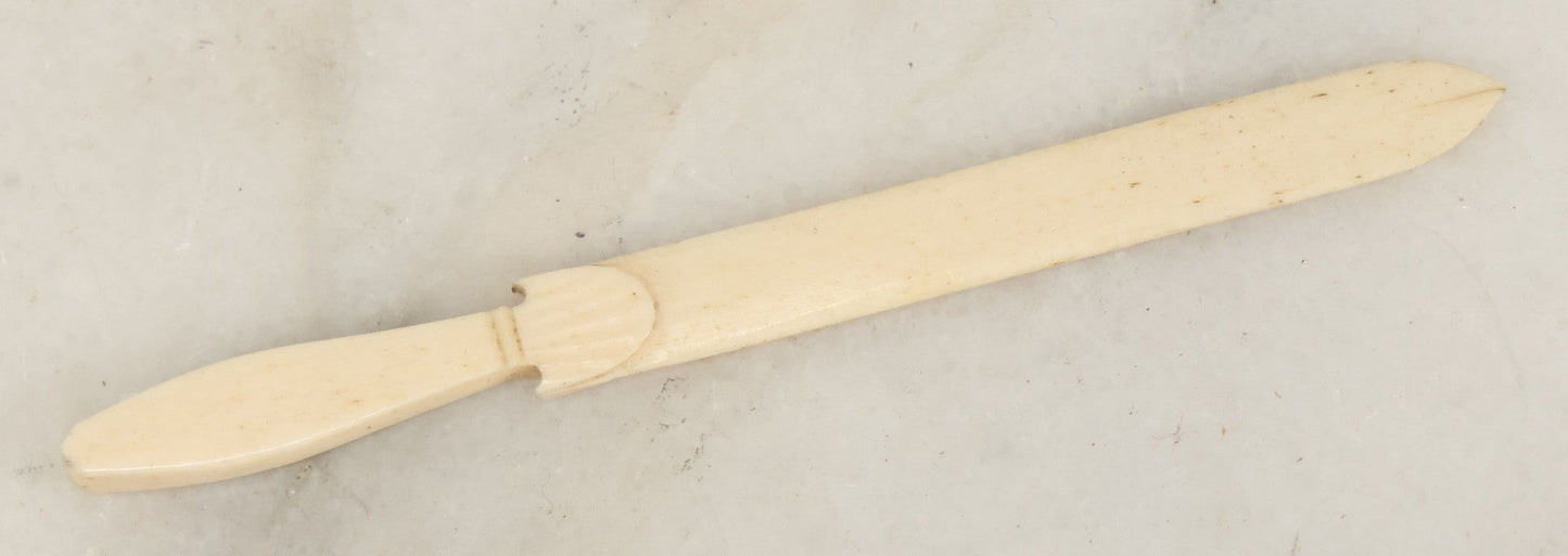 Lot 050 - Antique Carved Scrimshaw Bone Miniature Sword, Primitive Handcrafted Design