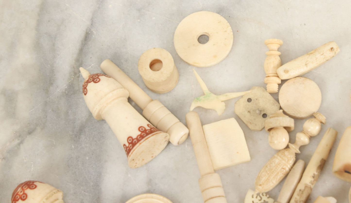 Lot 059 - Grouping Of Antique And Vintage Bone Fragments, Chess Pieces, Rings, Spindles, And Miscellaneous Items, 20+ Pieces