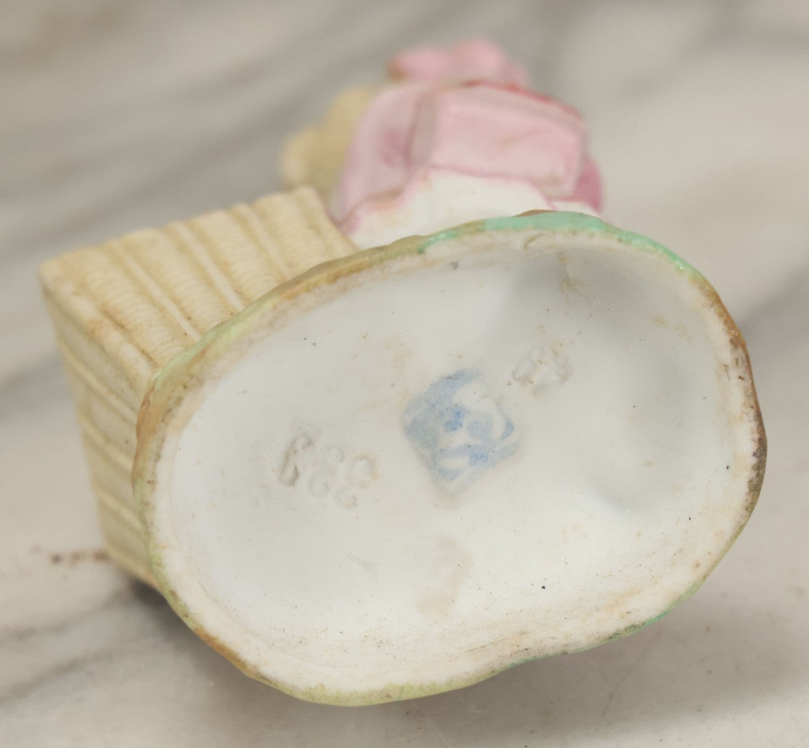 Lot 065 - Antique Hand-Painted Bisque Girl Figural Match Strike, Match Safe, Pink Dress And Bonnet, Likely German