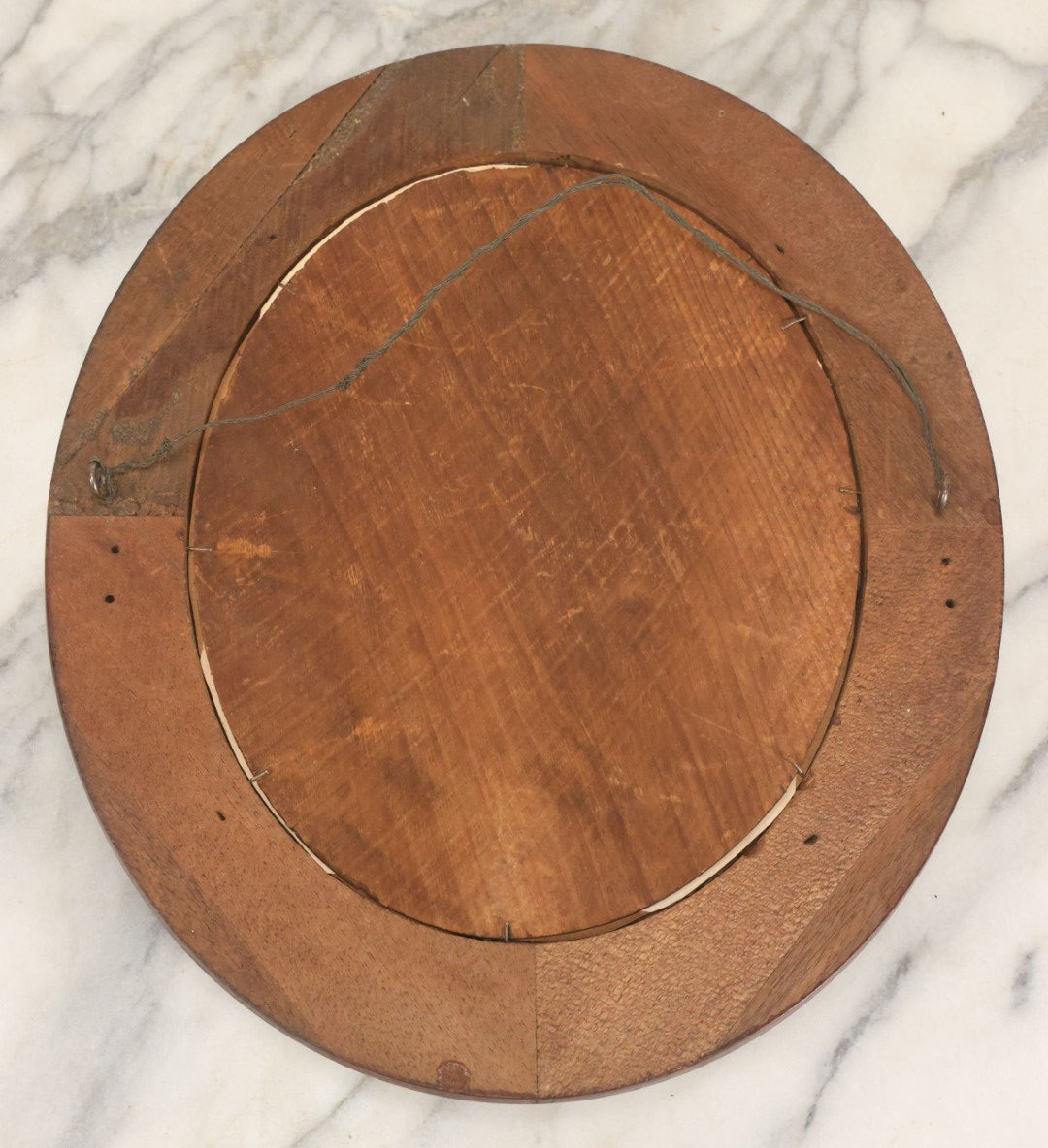 Lot 095 - Antique Hand Cut Paper Silhouette Of A Young Girl In A Deep Oval Frame, 11-3/8 x 13-3/8"