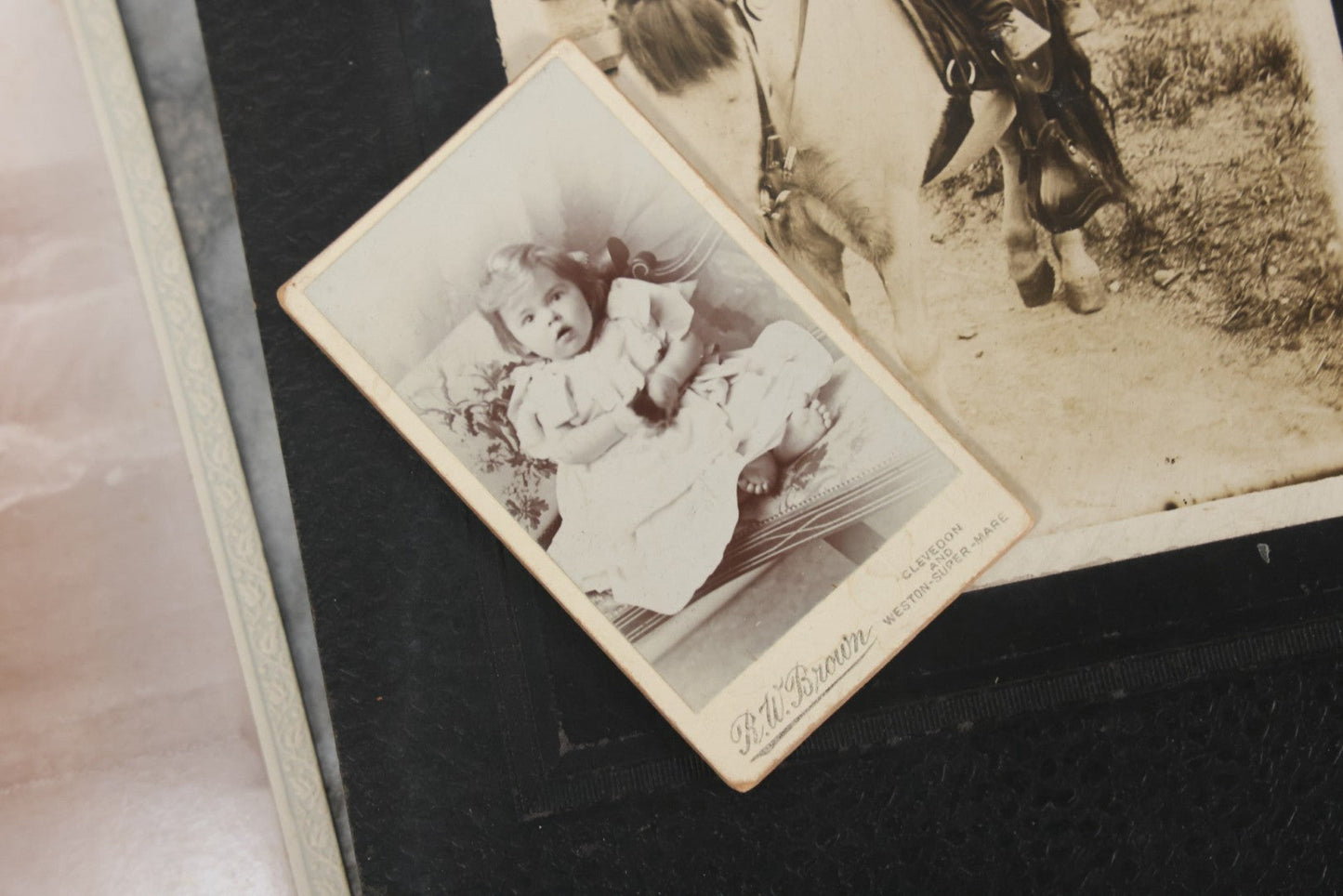 Lot 126 - Grouping Of 10+ Antique And Vintage Cabinet Card, Boarded, And Snapshot Photographs Of Children Posing And At Play, Including Girl With Dog, Children On Horse, Boy On Bicycle, And Boy On Sled
