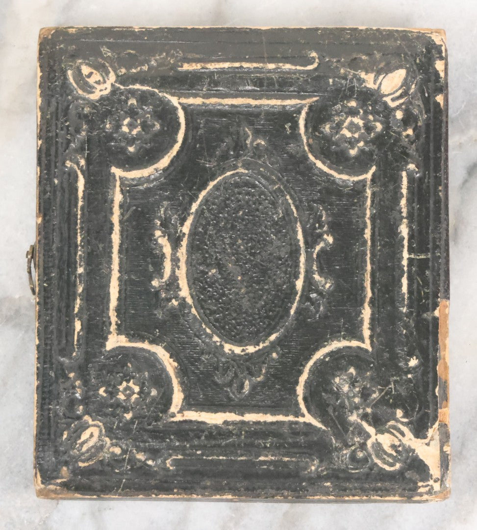 Lot 056 - Antique 1/6th Plate Ambrotype Photograph Of Young Couple Including Man With Messy Beard, Both With Gold-Tinted Jewelry, In Split Half Leatherette Union Case