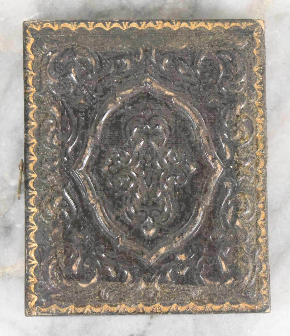 Lot 057 - Antique 1/9th Plate Ambrotype Photograph Of Pretty Young Woman With Slight Smile And Bob Hairdo, In Split Half Leatherette Union Case