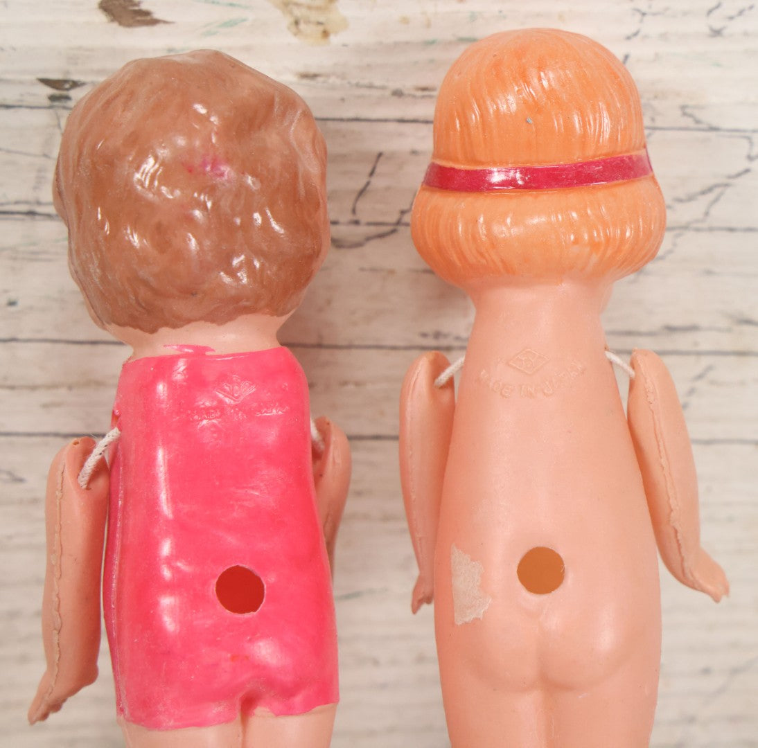 Lot 096 - Pair Of Vintage Celluloid Flapper Dolls, Made In Japan, One With Pink Headband And One With Pink Swimsuit