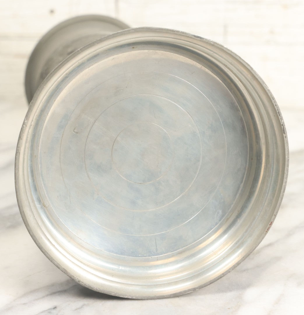 Lot 002 - Antique German Pewter Stein With Eagle, Griffin, And Cherub Motifs, Hinged Lid, Overall Height 14-1/4", Base 6-3/8" Diameter