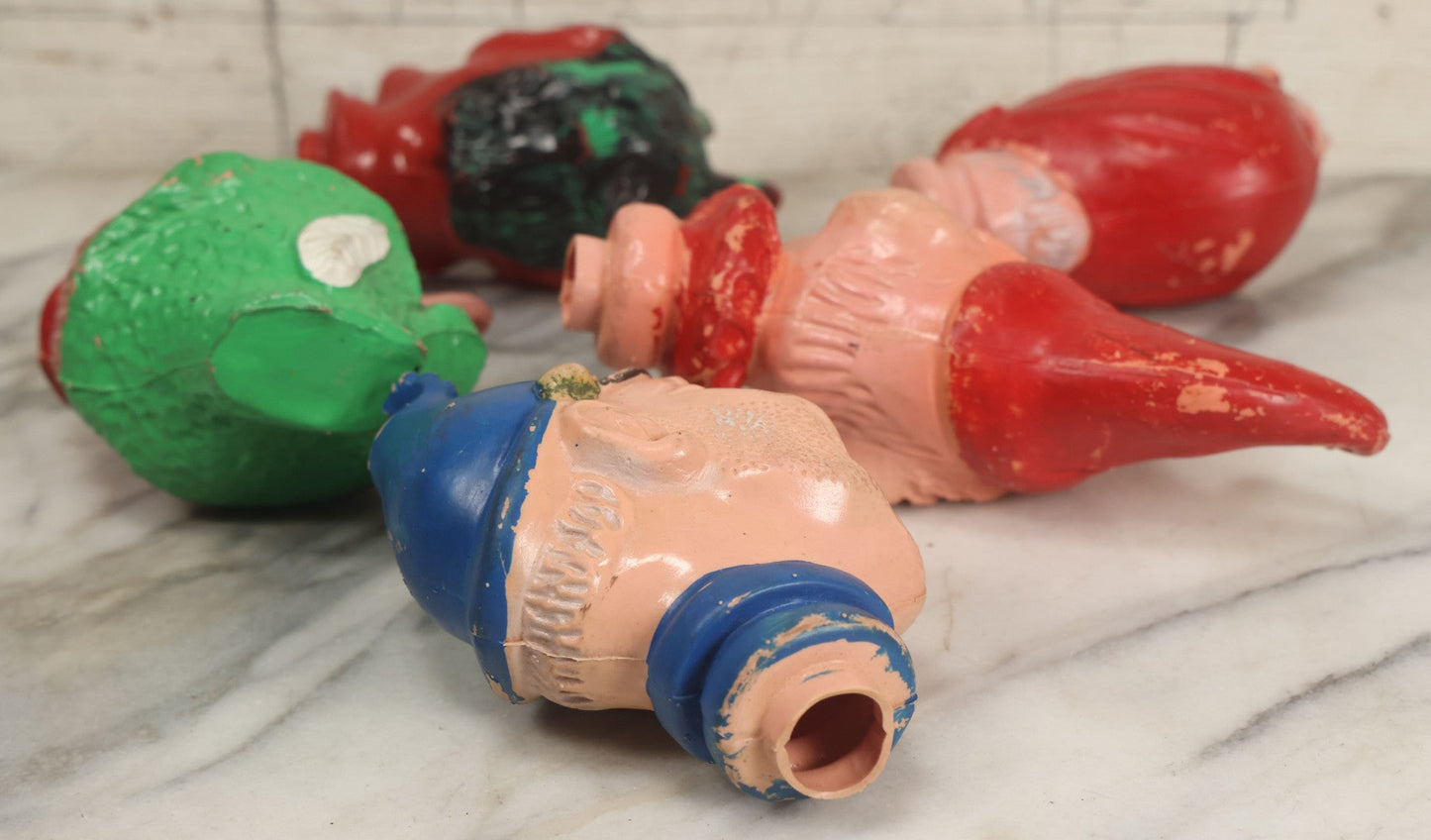 Lot 029 - Grouping Of Five Vintage Punch And Judy Style Rubber Puppet Heads Including Devil, Pirate, Cop, And Others