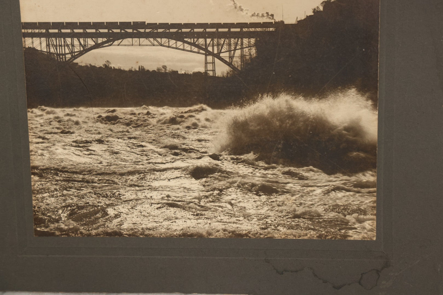 Lot 066 - Antique Boarded Photograph Of A Train Crossing The Whirlpool Rapids Bridge Between The United States And Canada, Niagara Falls