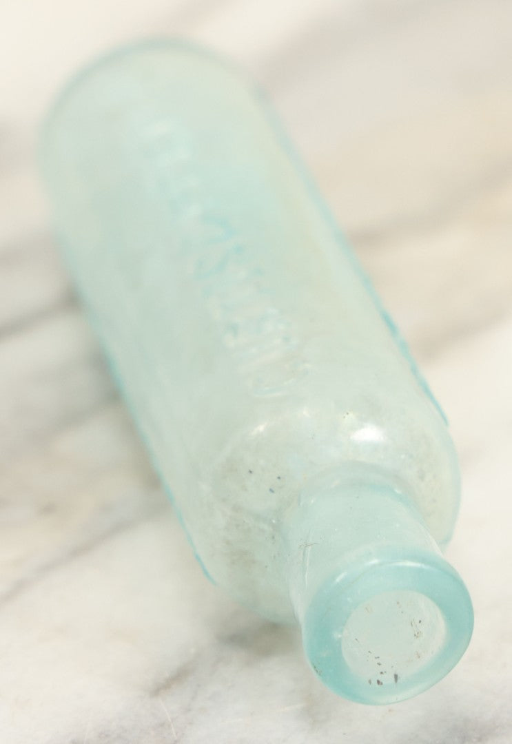 Lot 024 - Antique Mrs. Winslow's Soothing Syrup Medicine Bottle, Curtis & Perkins, Proprietors