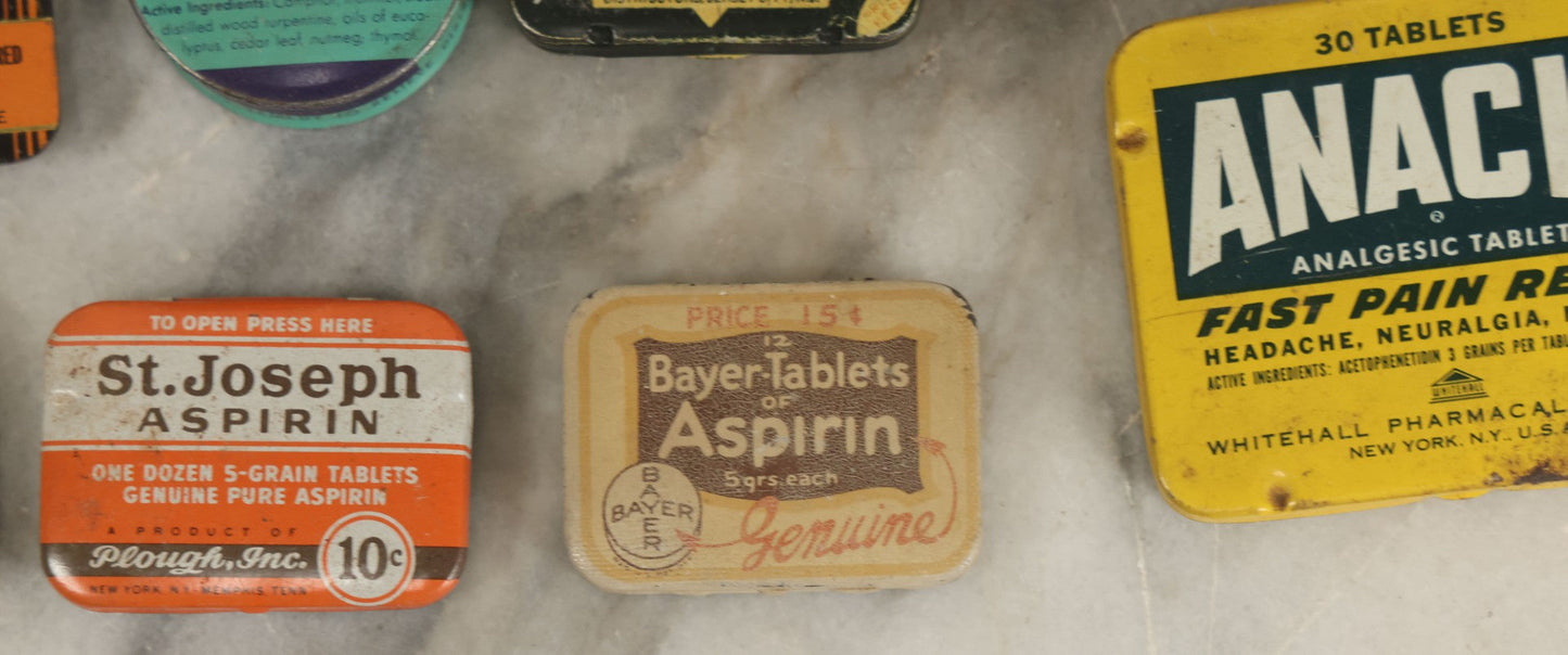 Lot 076 - Grouping Of 14 Pharmacy Tins (Smaller Size) Including Analax Chewies, Doan's Pills, And Vicks Vaporub