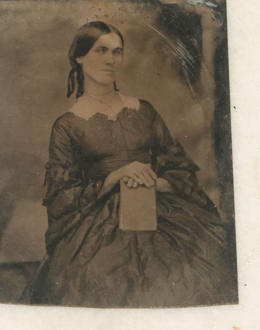 Lot 040 - Grouping Of Five Antique Tintype Photographs Of Women Posing With Books