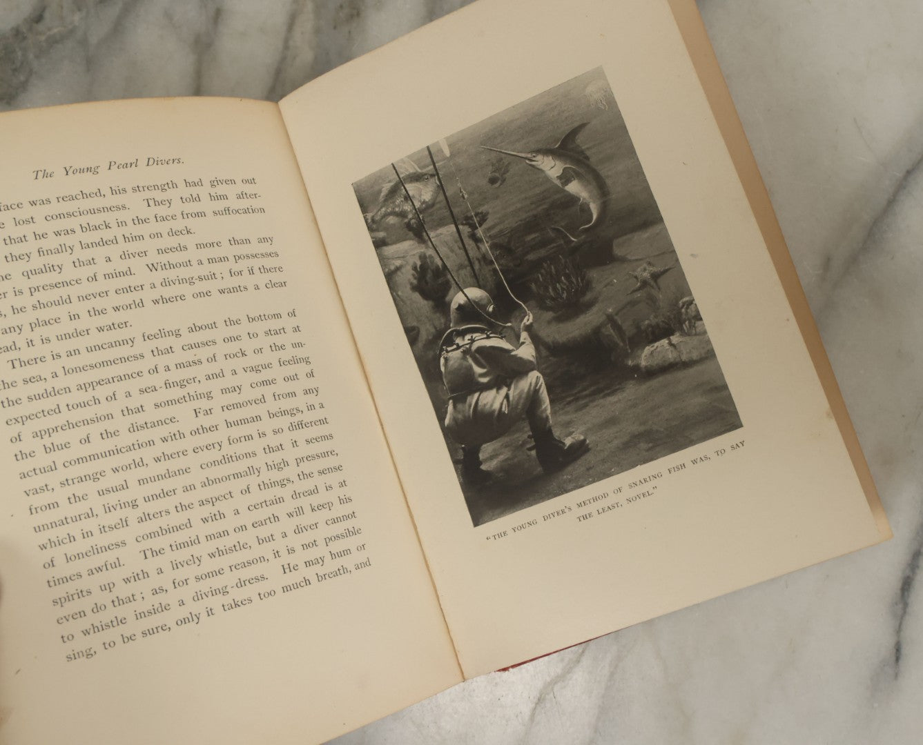 Lot 049 - "The Young Pearl Divers, A Story Of Australian Adventure By Land And Sea", Antique Book By Lieutenant H. Phelps Whitmarsh, Illustrated By H. Burgess, Joseph Knight Co., Publishers, Boston, 1896, (Red Cover With Octopus)
