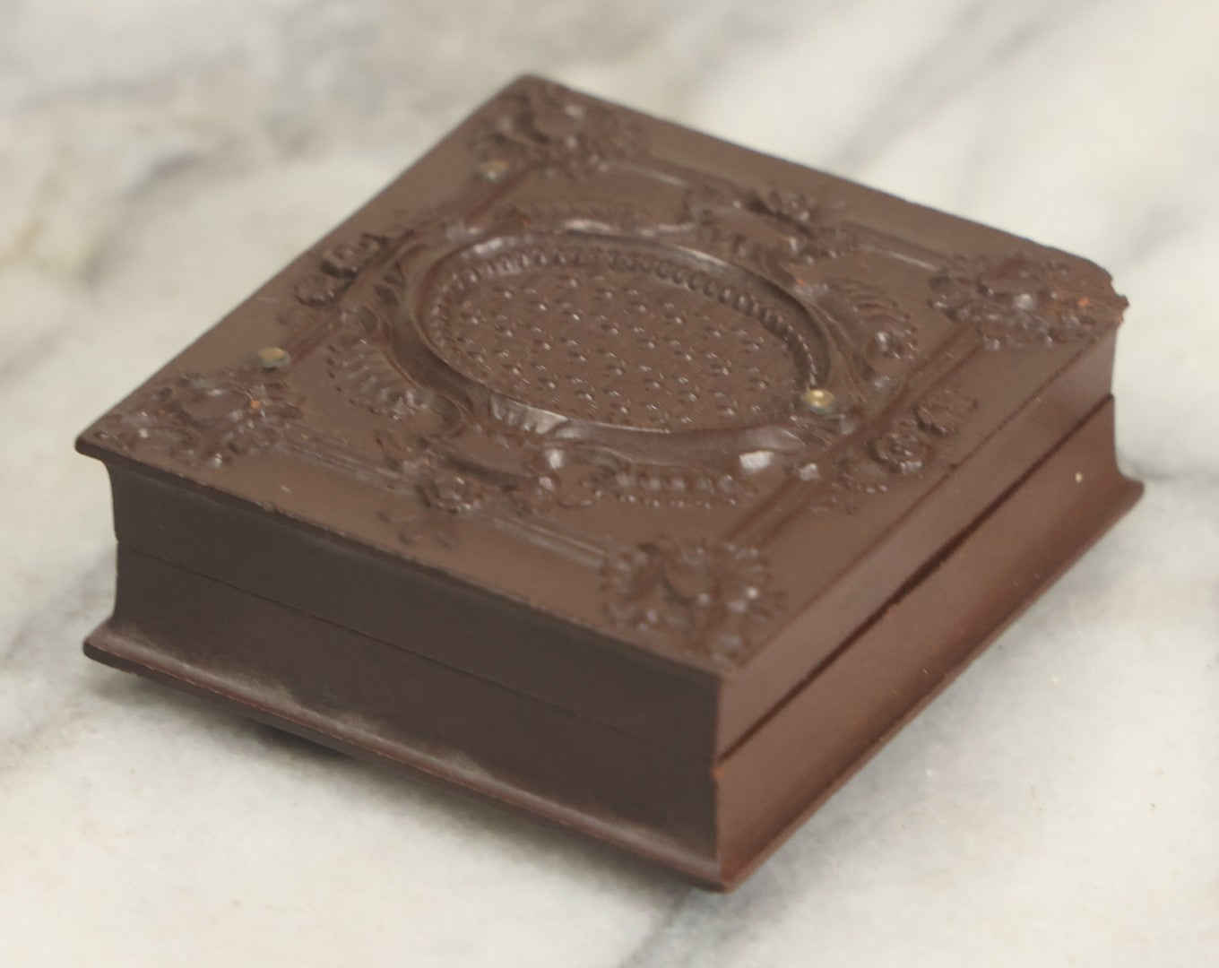 Lot 015 - Antique 1/16th Plate Ambrotype Photograph Of A Man With A 1000 Yard Stare A Comically Wide White Bowtie In A Thermoplastic Case, Genuine Union Case, Improved, Manufactured By S. Peck & Co.