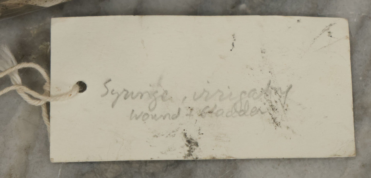 Lot 051 - Grouping Of Ten Vintage Medical Devices, Including Spection Devices, Irrigation Syringe, Etc., With Paper Identification Tags