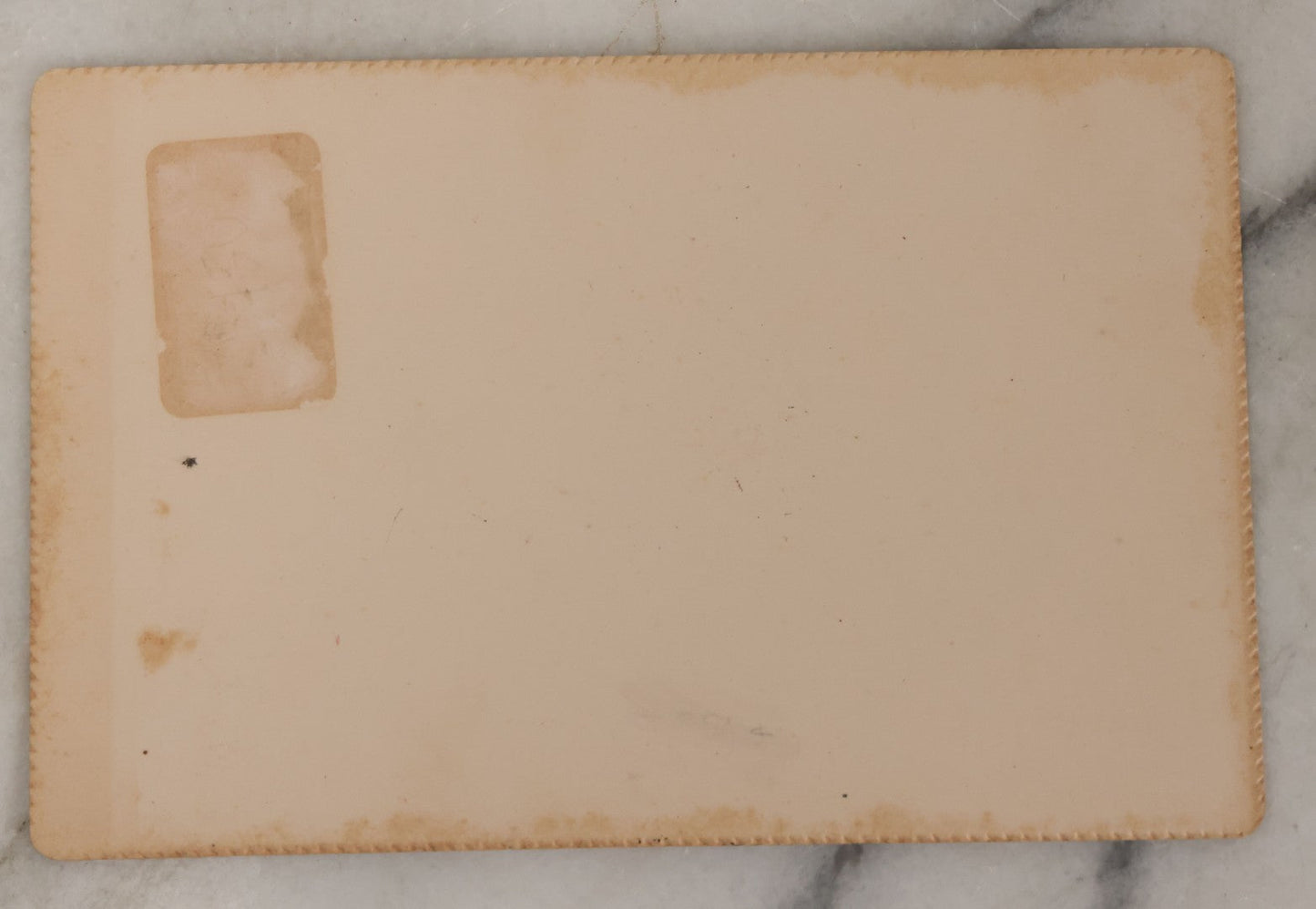 Lot 027 - Antique Cabinet Card Postmortem Photograph Of Baby Laying On Pillows With Dark Background, J.H. Langhans, Photographer, Little Valley, New York