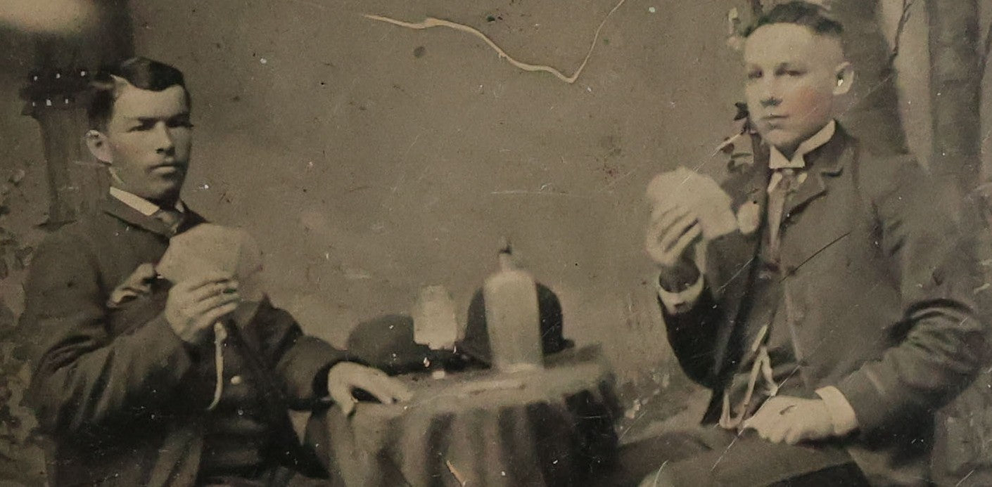 Lot 072 - Single Antique Tintype Photograph Of Two Young Men Playing Cards And Drinking With Bowler Hats On Small Table