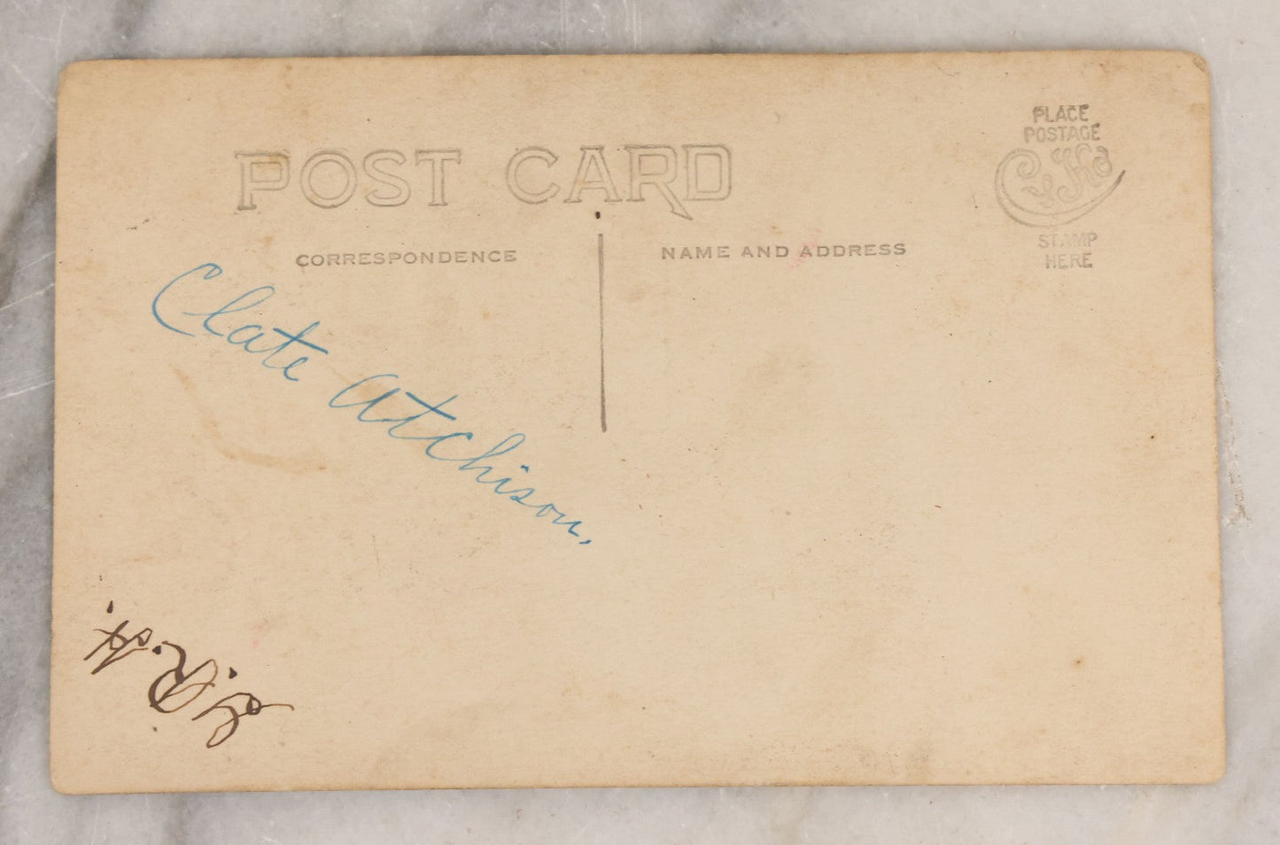 Lot 083 - Pair Of Antique Real Photo Postcards R.P.P.C. Of A Gun Slingin' Cowgirl Holding A Revolver, Dated August 1912 On Verso, And Kind Looking Farm Boy In Coveralls And Cowboy Hat Smoking