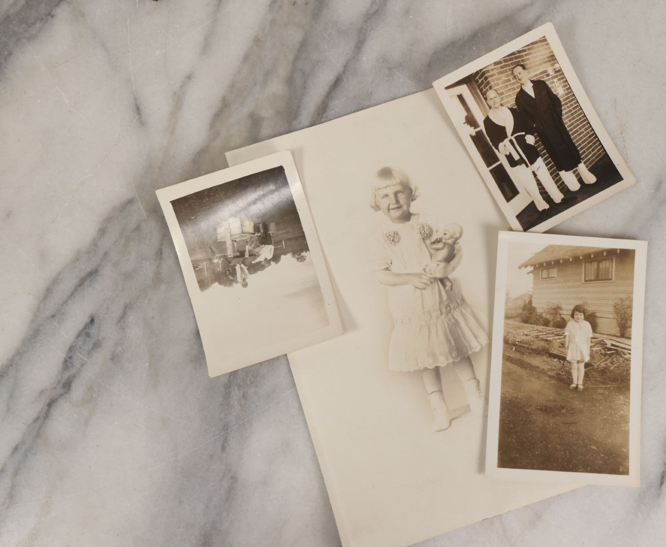 Lot 085 - Grouping Of 50+ Vintage Snapshot Photographs, Mostly Of Children At Play, Including Boy Dressed As Cowboy, Boy Dressed As Canadian Mountie Police Officer With Pistol, Children Skiing, Sledding, And More, Circa 1920s To 1960s