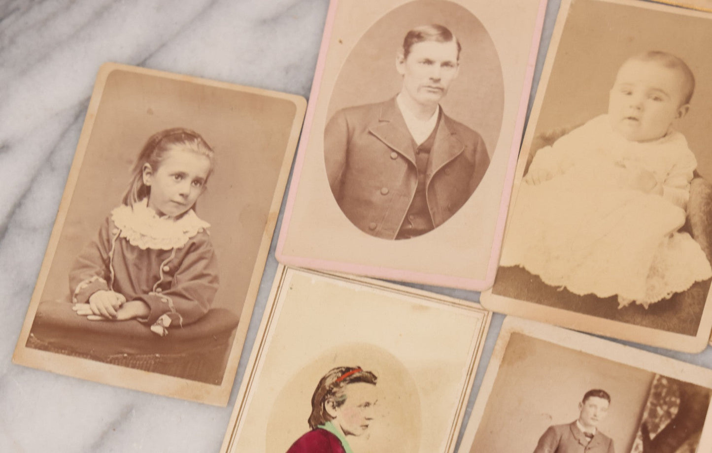 Lot 097 - Grouping Of 41 Carte De Visite C.D.V. Photographs Including Man In Bowler Hat, Man With Stick Cane, And Young Woman With Purple Tinted Dress