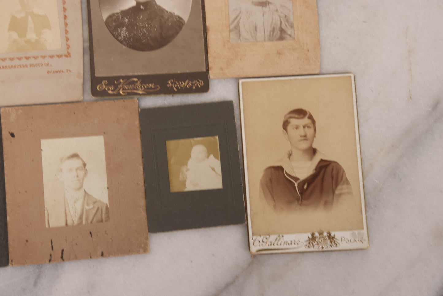 Lot 098 - Grouping Of 19 Antique Carte De Visite C.D.V. Photographs And Other Small Sized Portrait Photographs Including Two Hidden Mothers Of Babies, And Young Man In Navy Uniform
