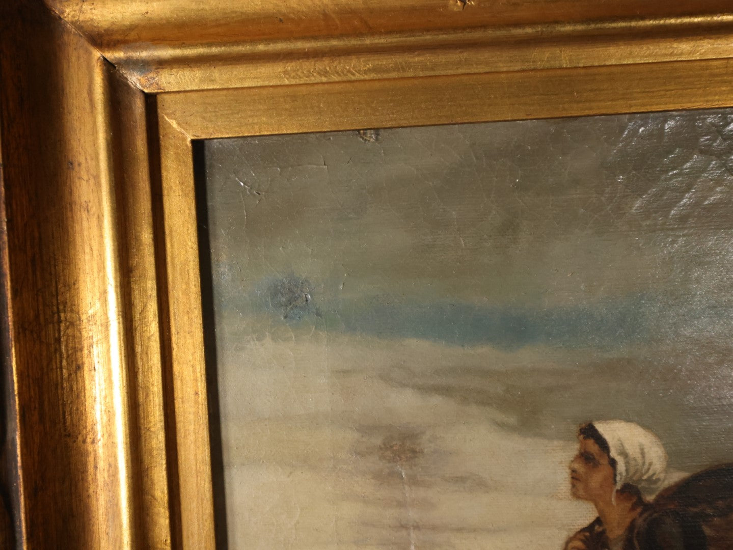 Antique Oil On Canvas Painting Of Young Woman Leaning Against Boat On The Beach With Basket On Back, White Hair Scarf, In Ornate Gilt Frame