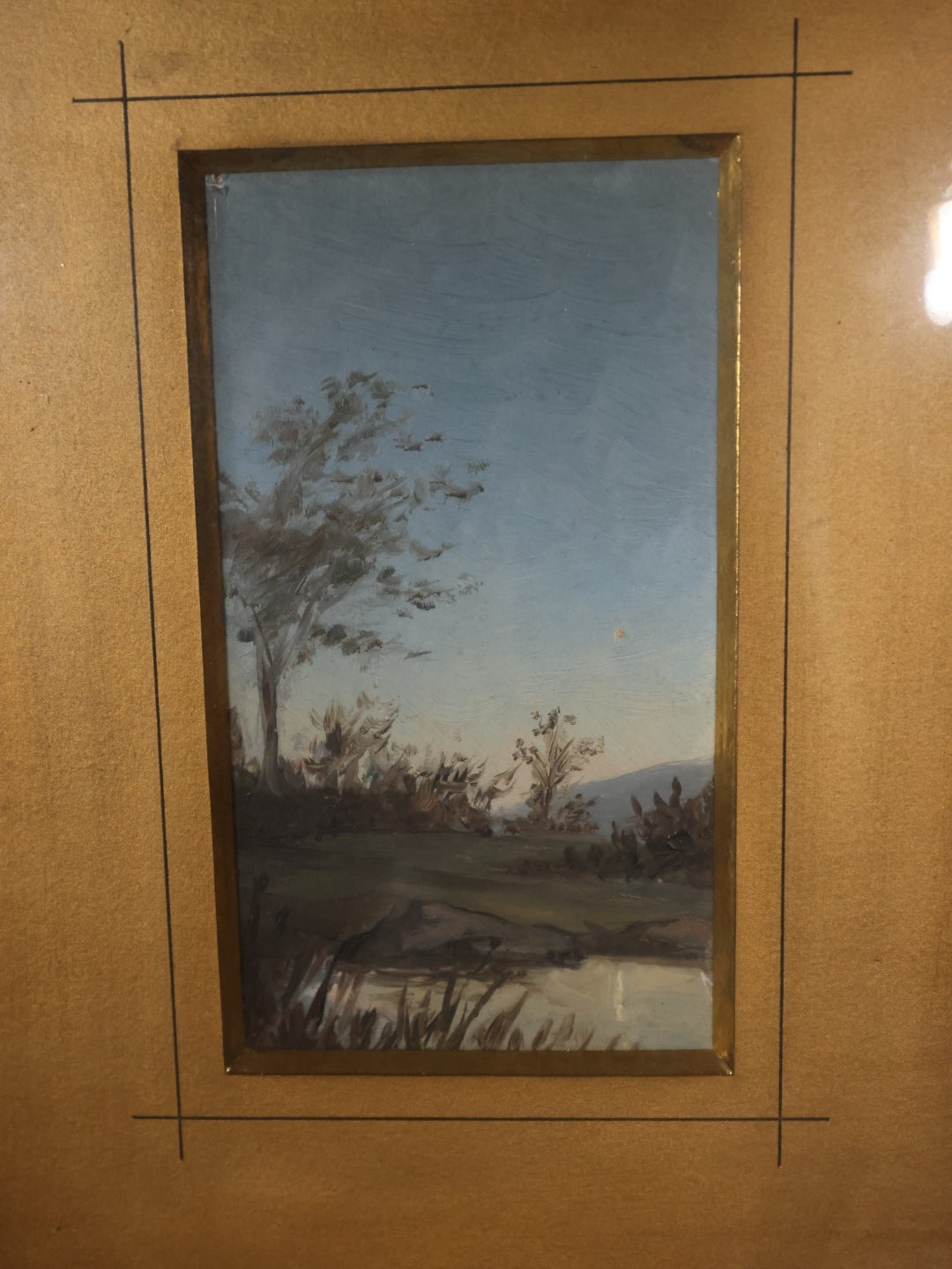 Antique Painting Of A Riverside With A Tree, Blue Skies, Matted And Framed Behind Glass