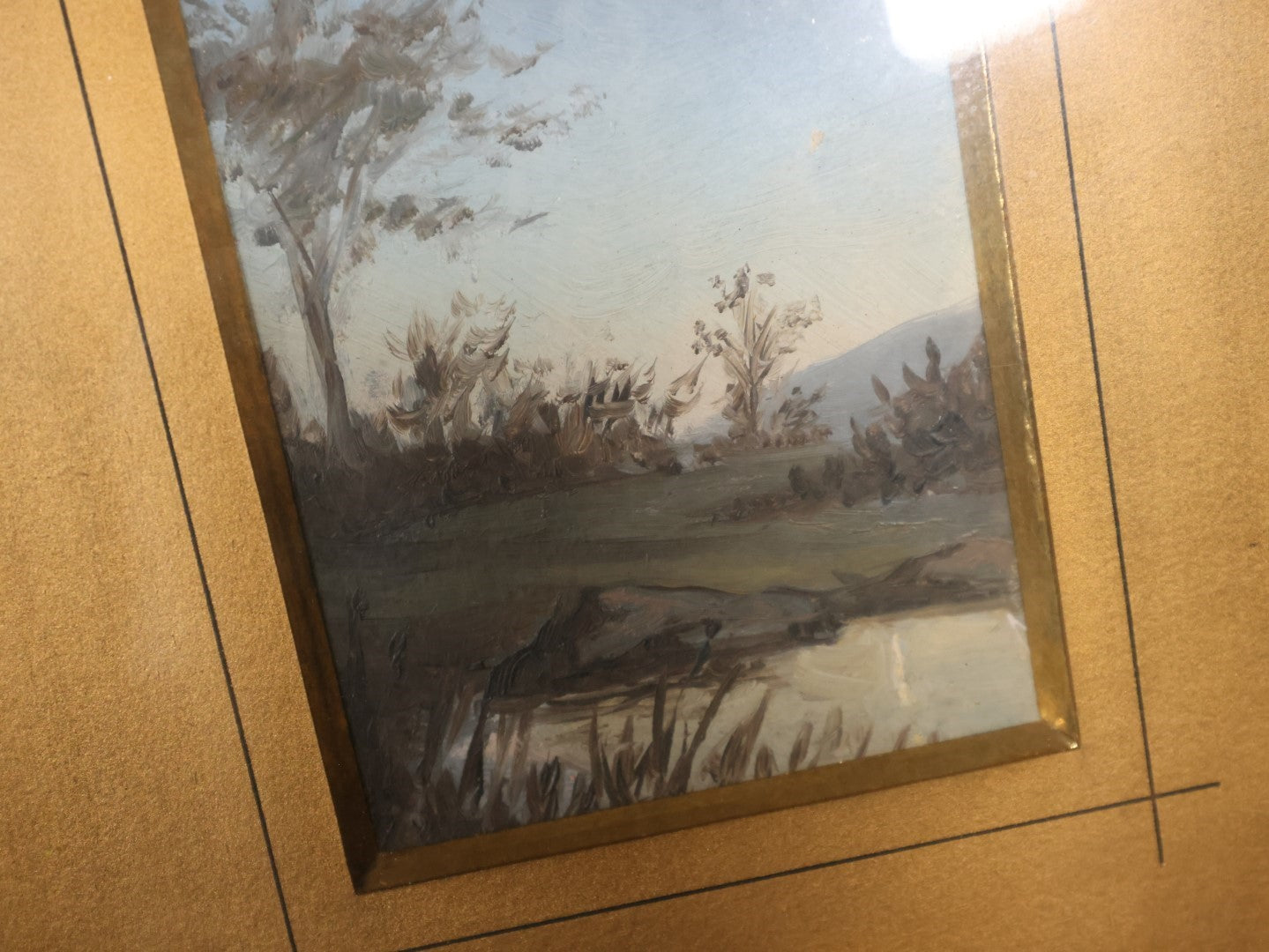 Antique Painting Of A Riverside With A Tree, Blue Skies, Matted And Framed Behind Glass