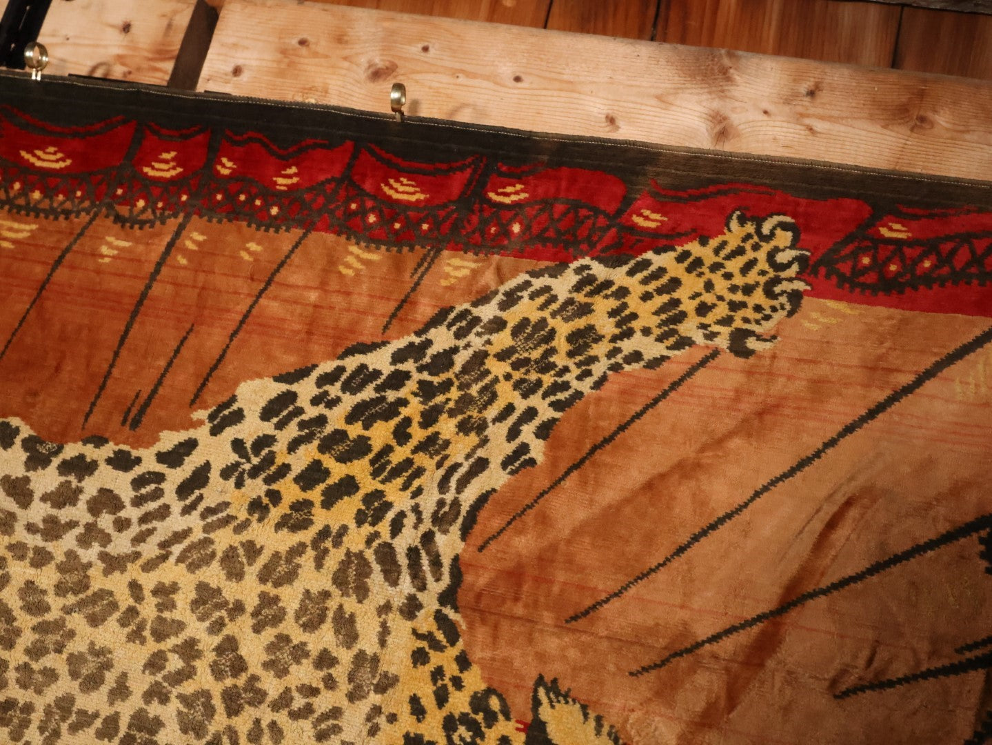 Large Antique Leopard Tapestry With Brass Hangers, Note Large Section Of Fading