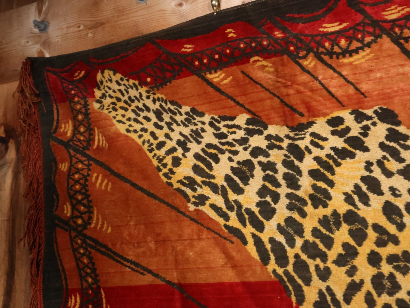 Large Antique Leopard Tapestry With Brass Hangers, Note Large Section Of Fading