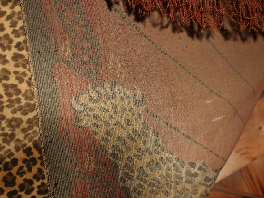 Large Antique Leopard Tapestry With Brass Hangers, Note Large Section Of Fading