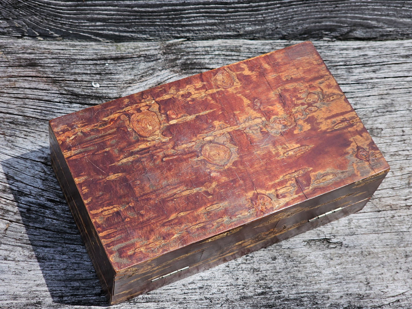 Antique wooden box with interesting veneer