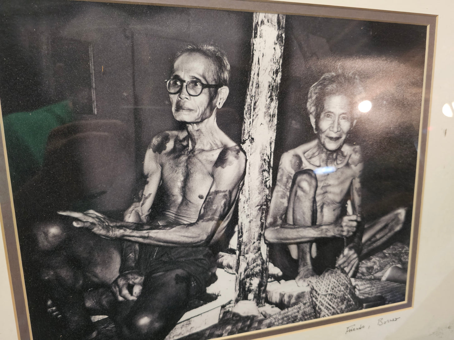 Vintage Framed Photo of Two Tattooed Individuals, Signed by Photographer Victor Friedmann, Titled "Friends, Borneo", 1981