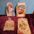 Lot 056 - Grouping Of Antique Victorian Die Cuts Including Girl With Chihuahua