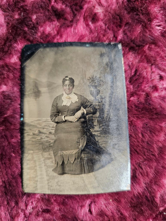 Tintype Of Black Woman, Slight Smile, Hands Holding The Other