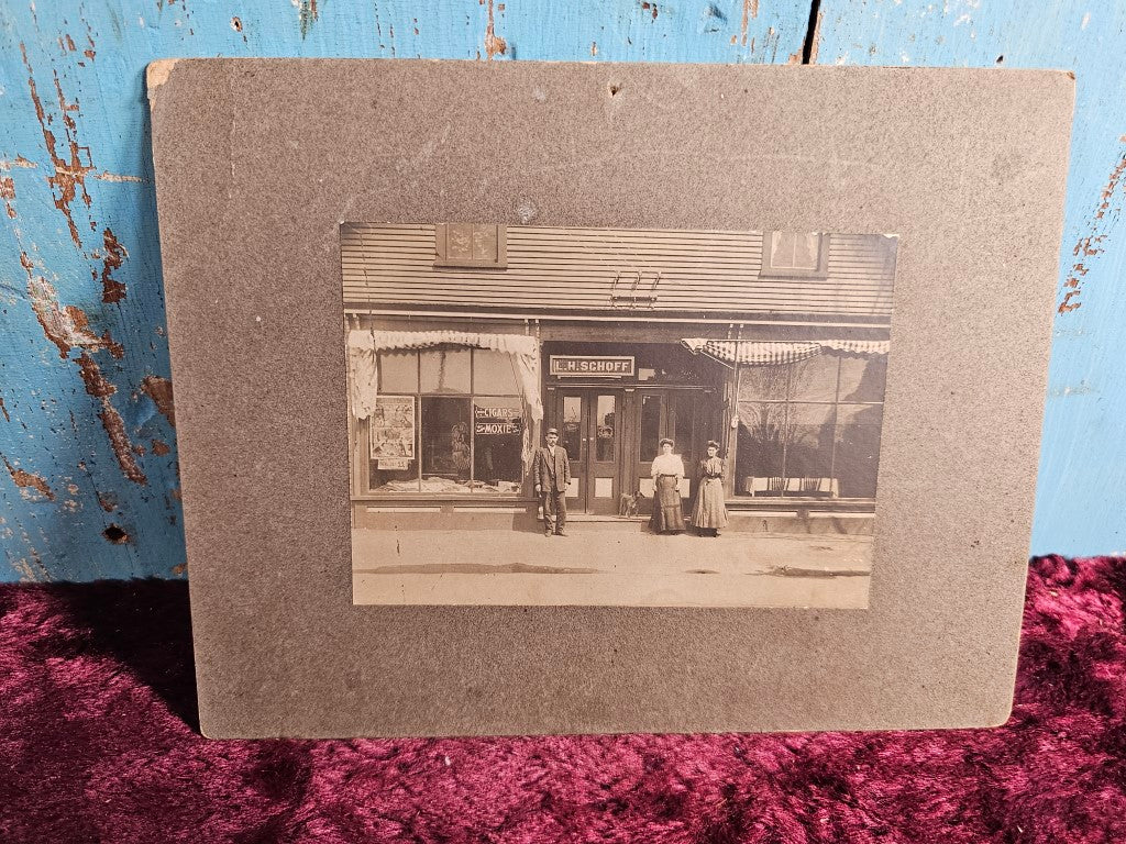 Boarded Exterior Photo Of General Store, Moxie Sign