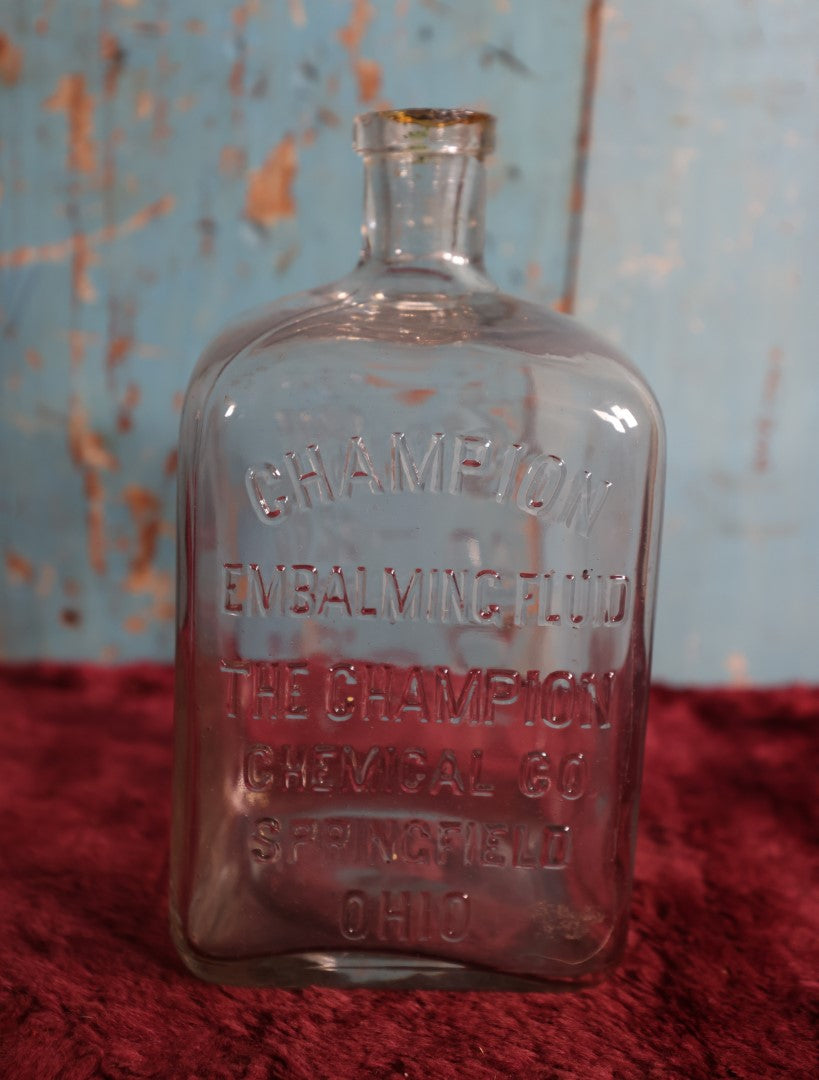 Lot 002 - Antique Champion Embalming Fluid Poison Bottle, The Champion Chemical Company, Springfield, Ohio, 56 Oz, Chipping On Lip