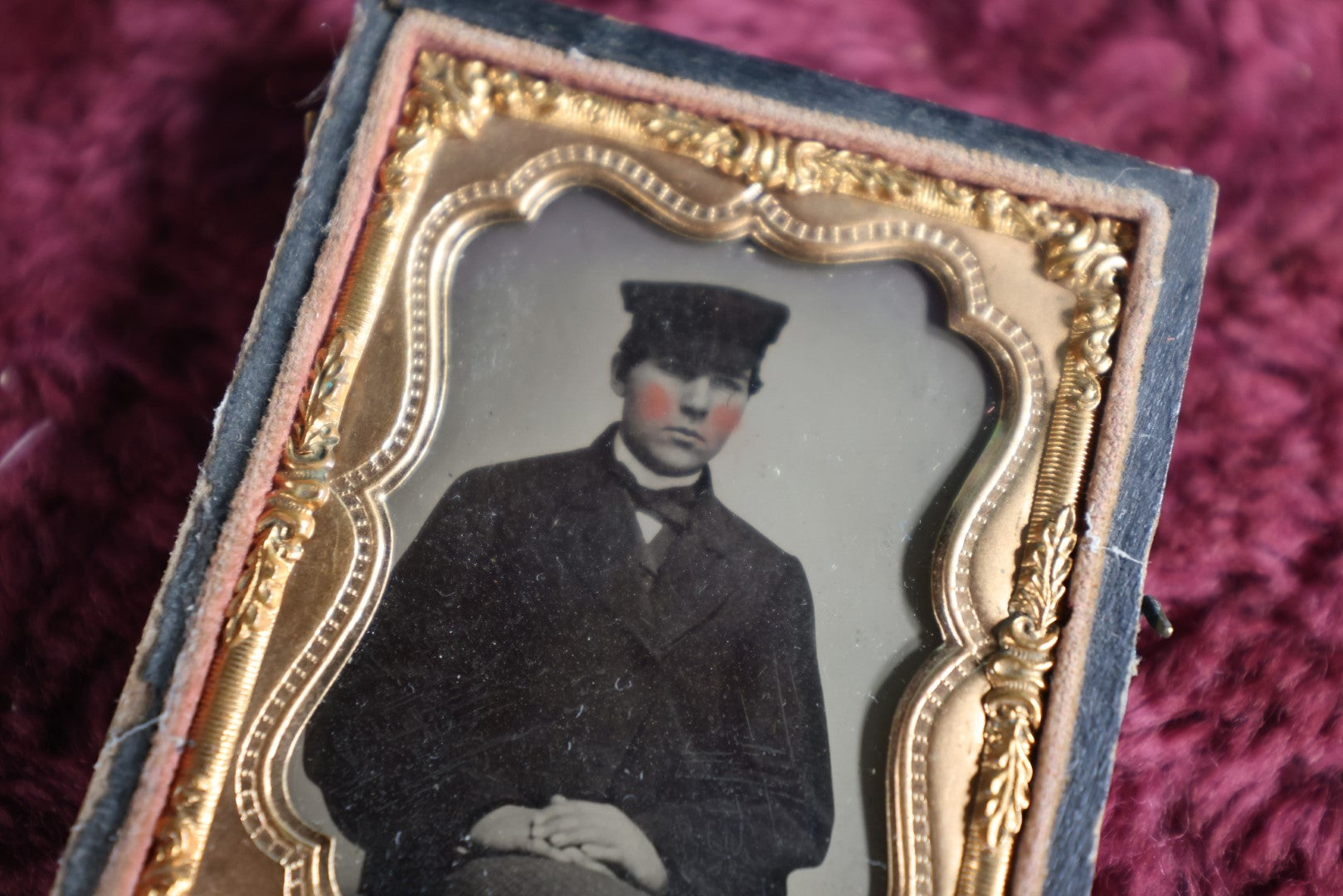 Lot 044 - Antique 9Th Plate Ambrotype Of Yound Man In Hat, Dark Clothes, Possible Occupational, In Half Leatherette Case