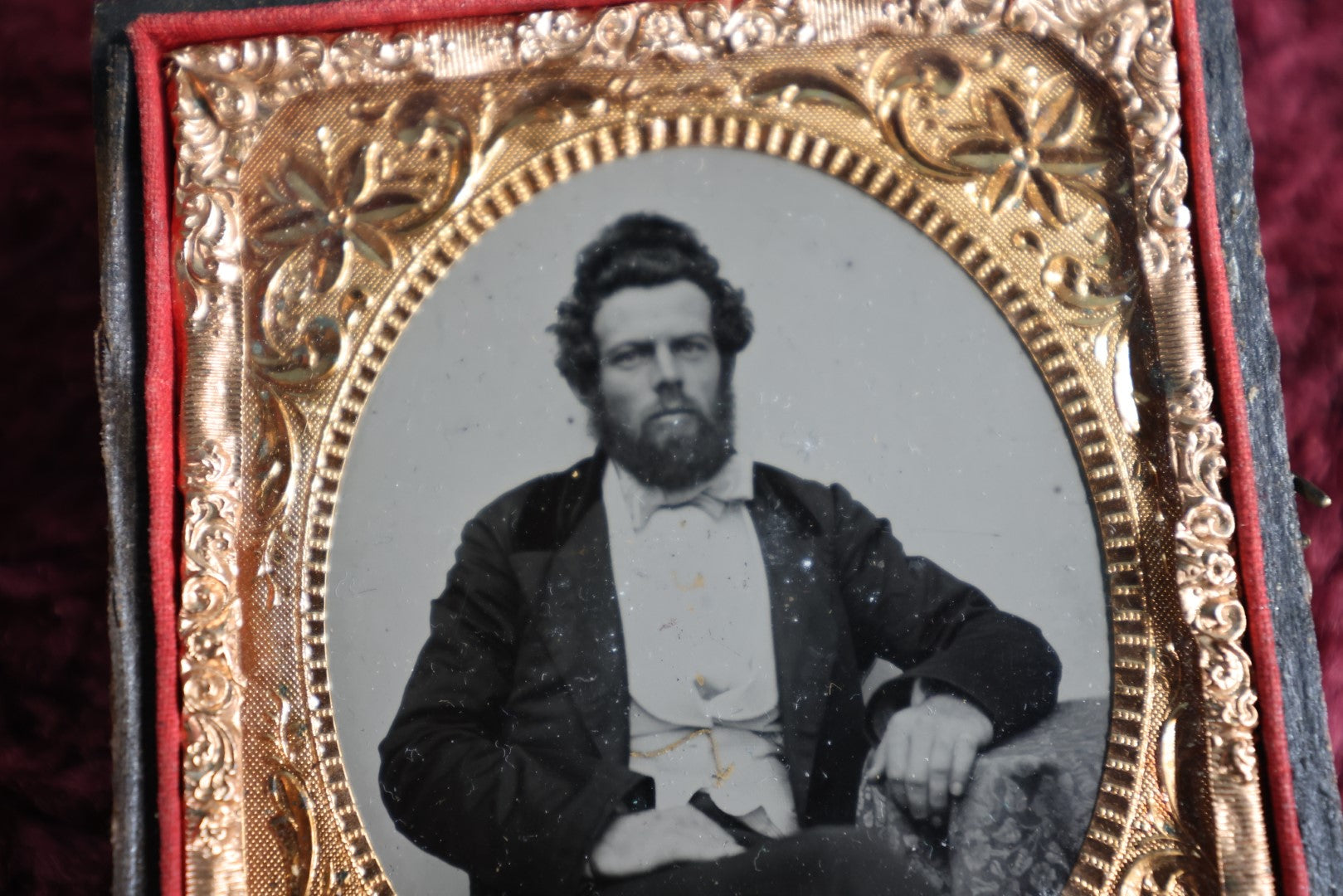 Lot 045 - Antique 6Th Plate Ambrotype Photograph Of Middle Aged Man, Disheveled Hair, Beard, Gold Tinting On Watch Chain, In Half Leatherette Case