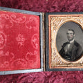Lot 048 - Antique 9th Plate Tintype Photograph Of Man With Tinted Cheeks, In Full Leatherette Case